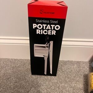 Stainless Steel Potato Ricer - Black Handle